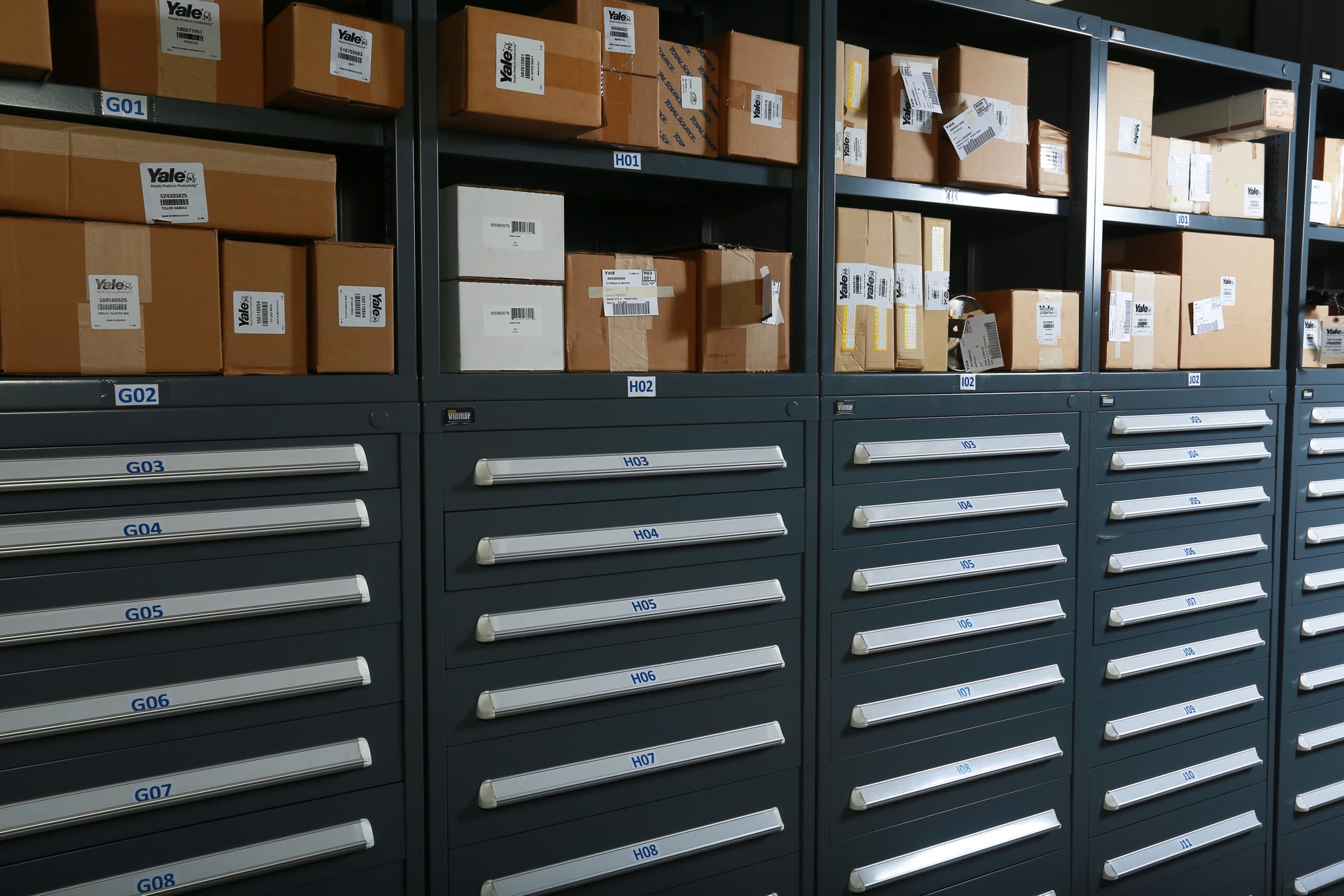 Forklift parts in boxes in a storage area