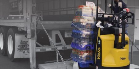 BW with beverages being unloaded