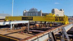 A crane lifting materials at a construction site