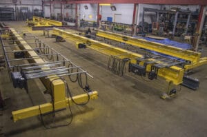 A spacious warehouse filled with various types of equipment, providing a diverse range of resources for different purposes.