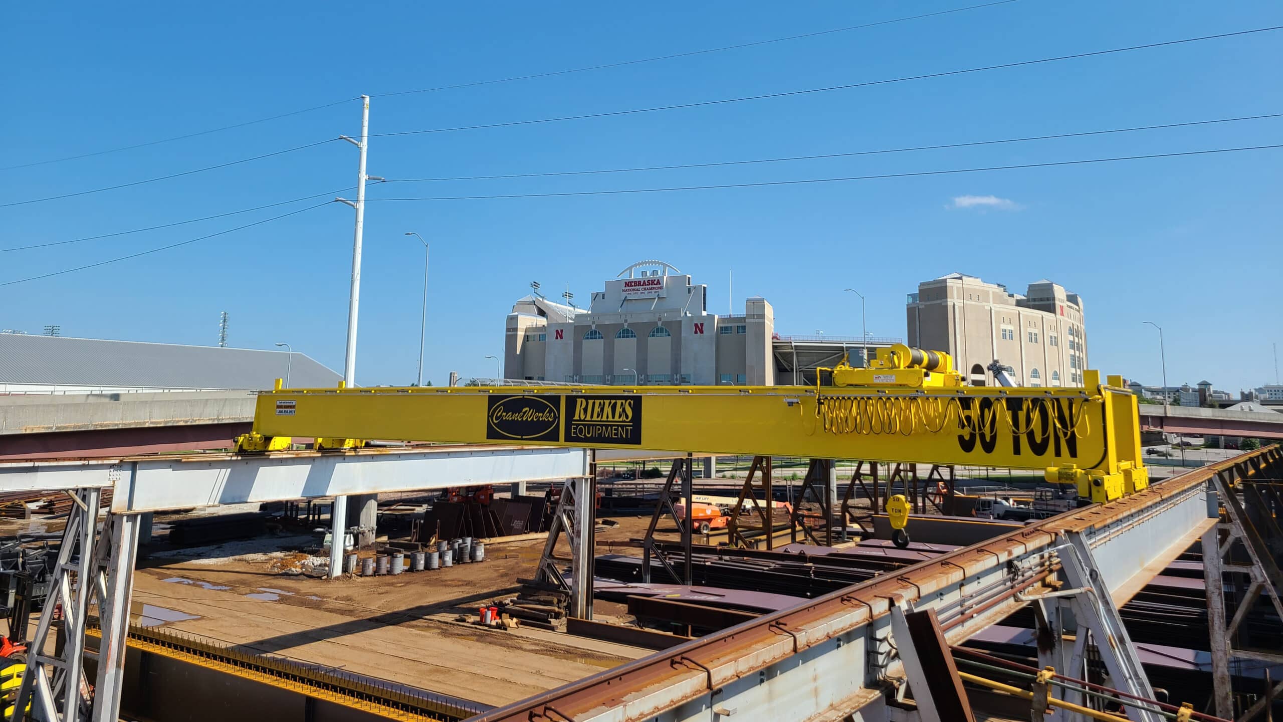 A crane lifting materials at a construction site
