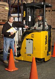 Warehouse worker doing operator training