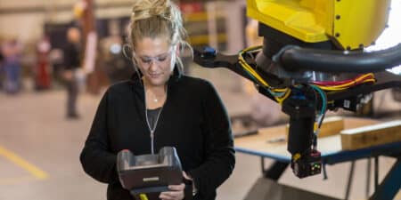 Automation worker using robotic arm