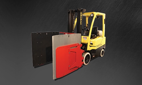 Hyster ICE Cushion Tire Forklift with a Bolzoni Auramo carton clamp attachment.