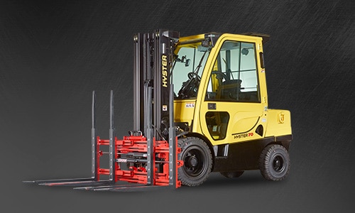 Hyster Pneumatic Tire ICE Forklift with a Bolzoni Auramo multi-pallet handler attachment.