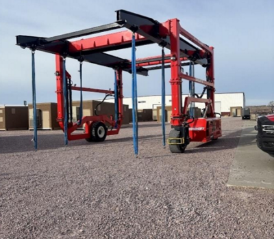 an image of a combilift SC3 straddle carrier that was ordered to move heavy loads of precast concrete buildings.