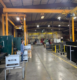 image of an overhead crane system in a warehouse
