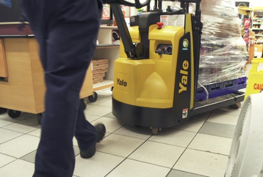 a driver easily bringing a pallet directly into the retail aisle with the direct store delivery package.